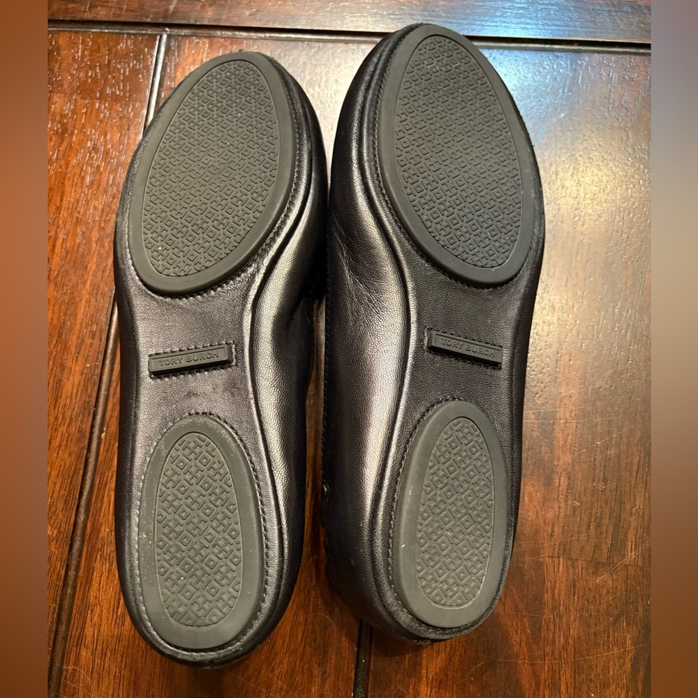 Tory Burch Black Flats with Gold Emblem - Picture 7 of 9